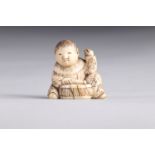 Netsuke / Okimono carved - a musician. Japan Meiji 19th century