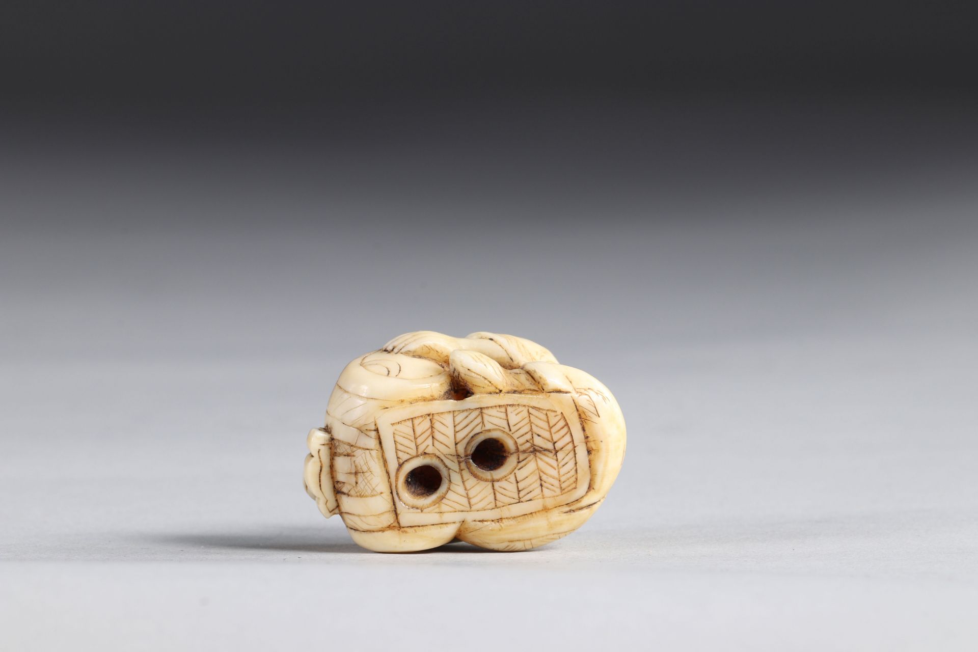 Netsuke carved - a character from a barrel. Japan Meiji 19th century - Image 5 of 5