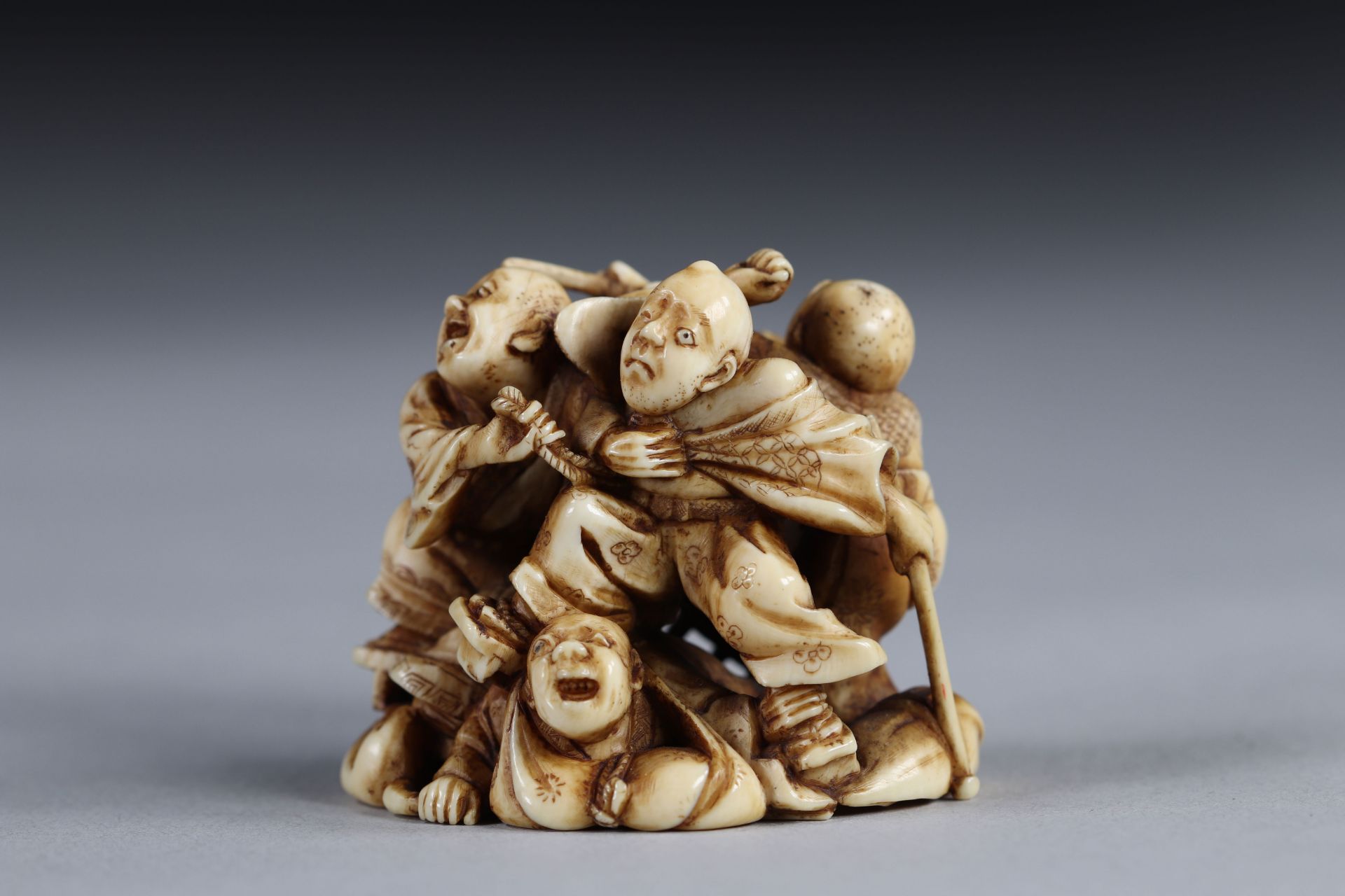 Intricately carved Netsuke - a wrestling scene. Japan Meiji period end - 19th century