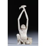 Netsuke carved - a cartoonish long-arm fisherman. Japan Meiji period late 19th