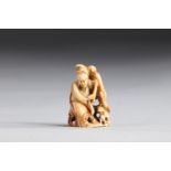 Netsuke carved - a woman. Japan Meiji 19th century