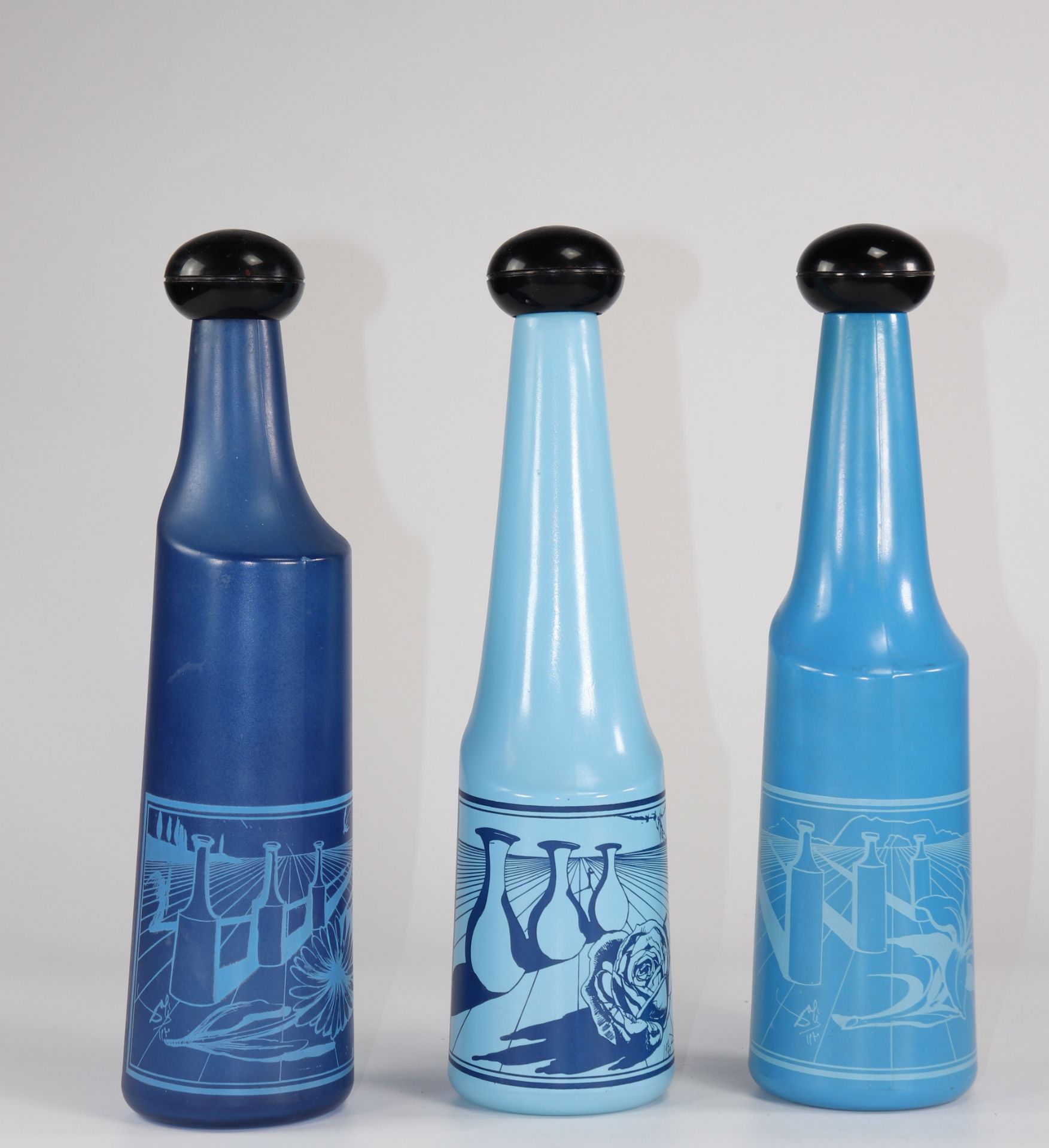 Salvador Dali"Botellas de vino" 1970-1972 Suite of three glass bottles each decorated with a differe