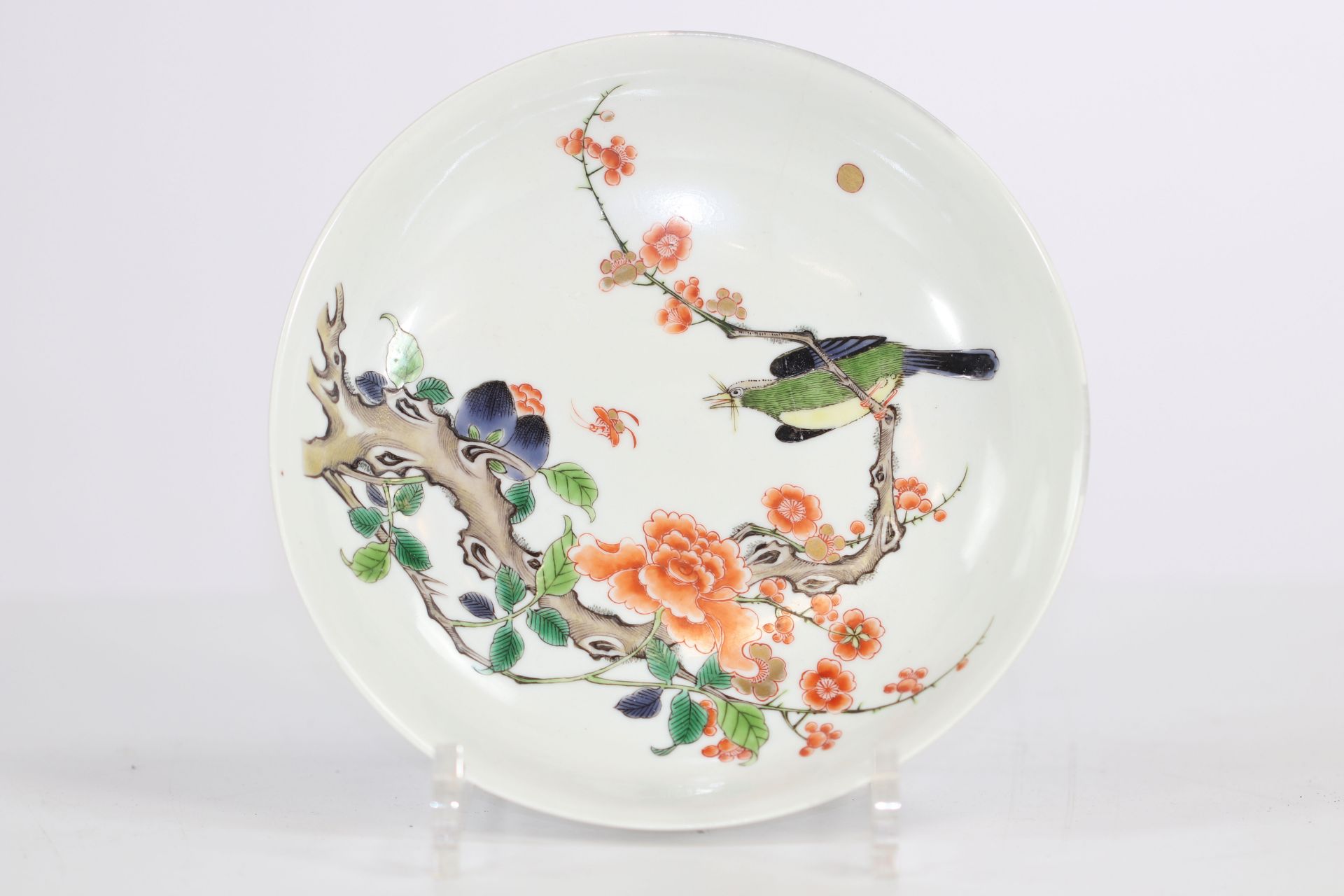 China Kangxi porcelain plate decorated with a trendy bird (restauraton)