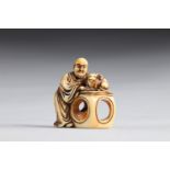 Netsuke carved - a character and an animal. Japan Edo period