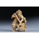 Netsuke / Okimono carved - a samurai fighting a tiger. Japan Meiji period late 19th