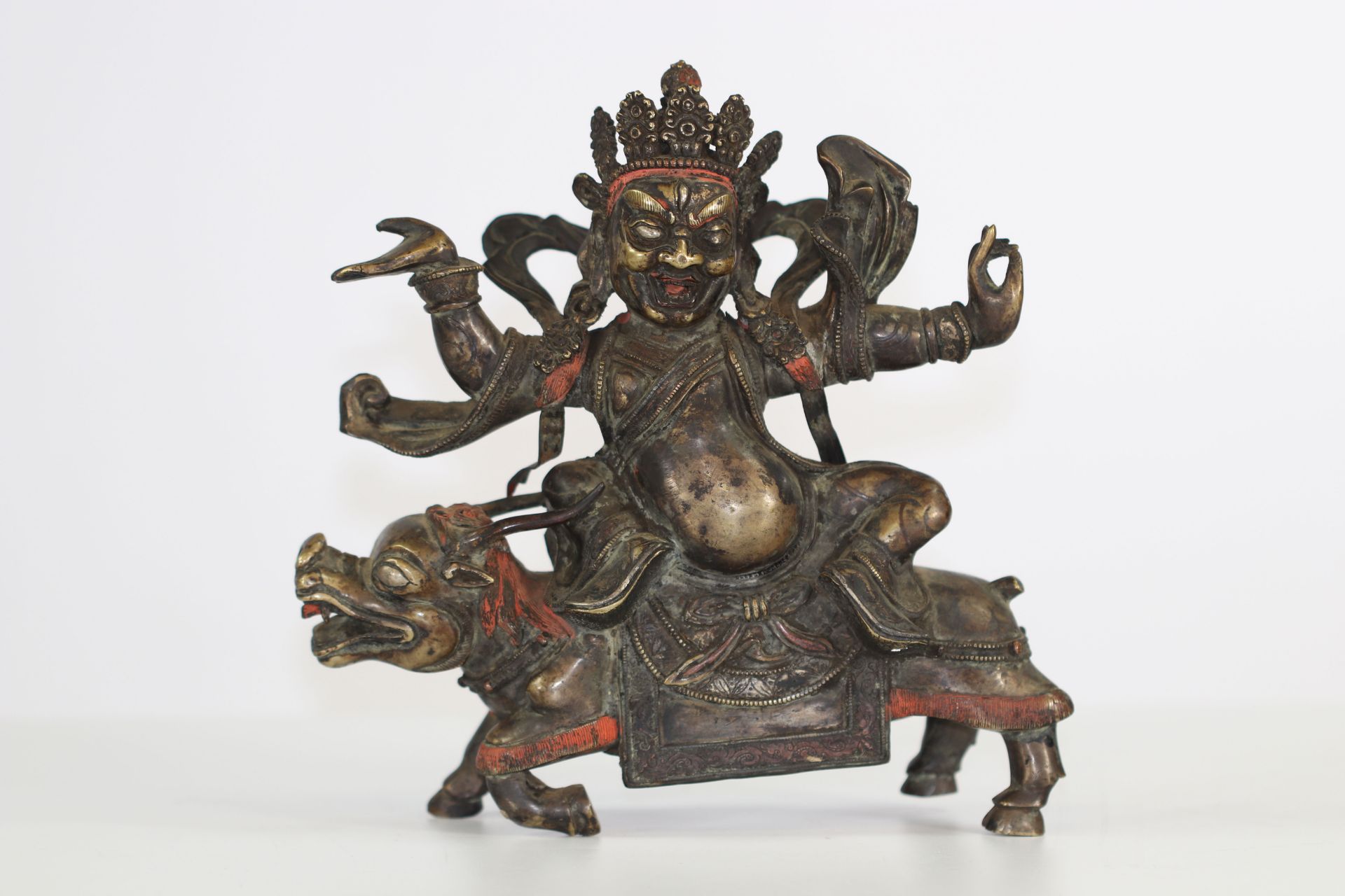 Tibet bronze sculpture of a deity on a buffalo