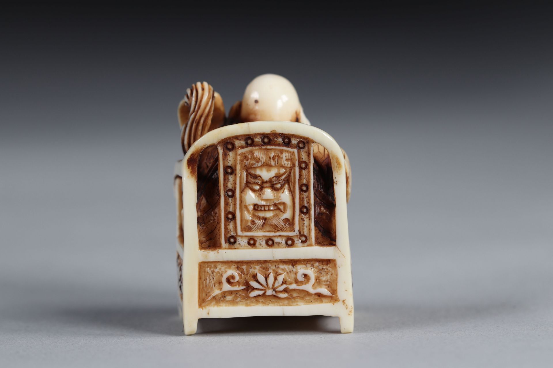 Netsuke carved - a Buddha seated on a throne. Japan Meiji period late 19th signature - Image 3 of 5