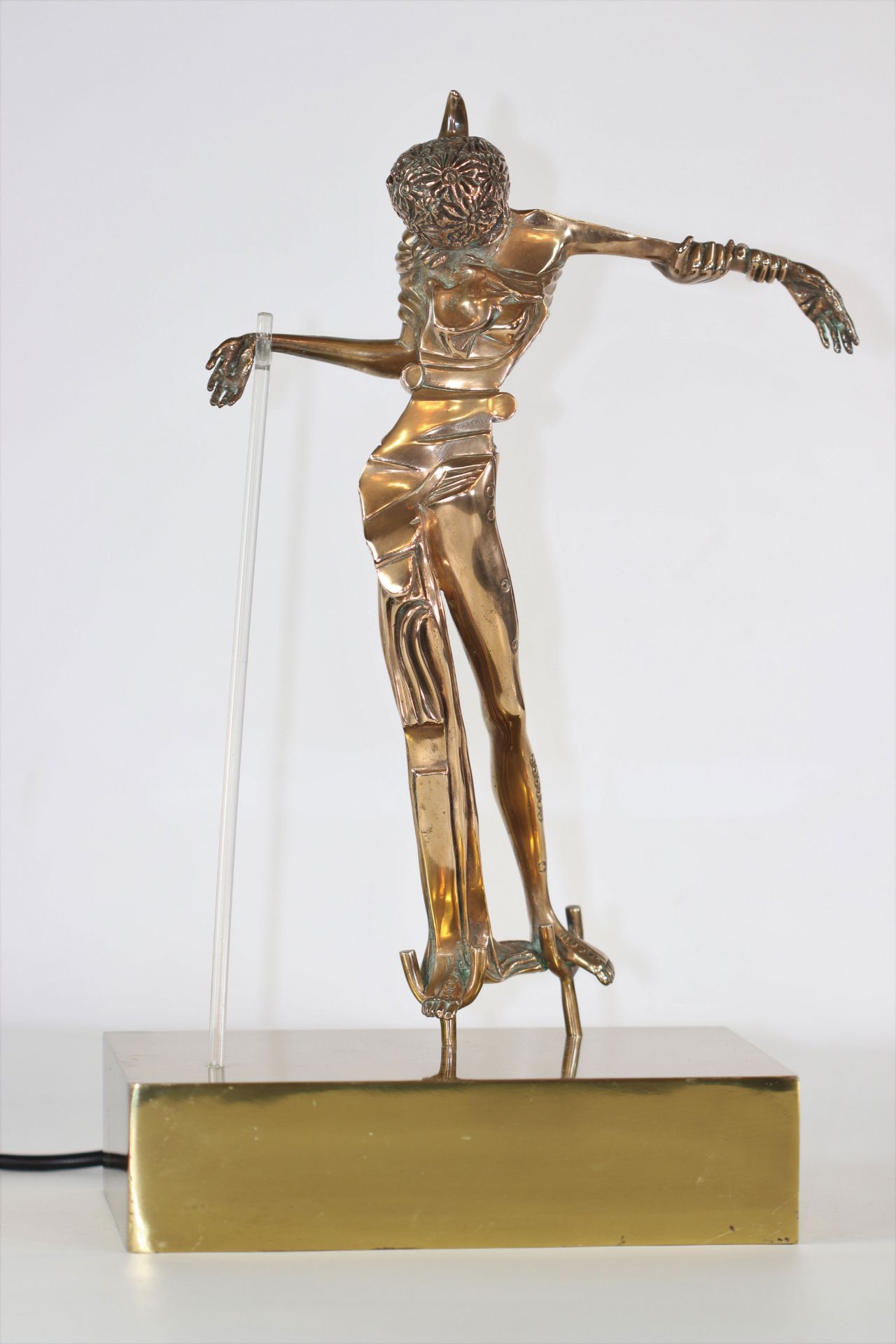 Salvador Dali Woman with the head of a rose Bronze with gilded patina, pvc crutch, mounted on a lumi
