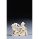 Netsuke carved from a group - figures. Japan Meiji period around 1900