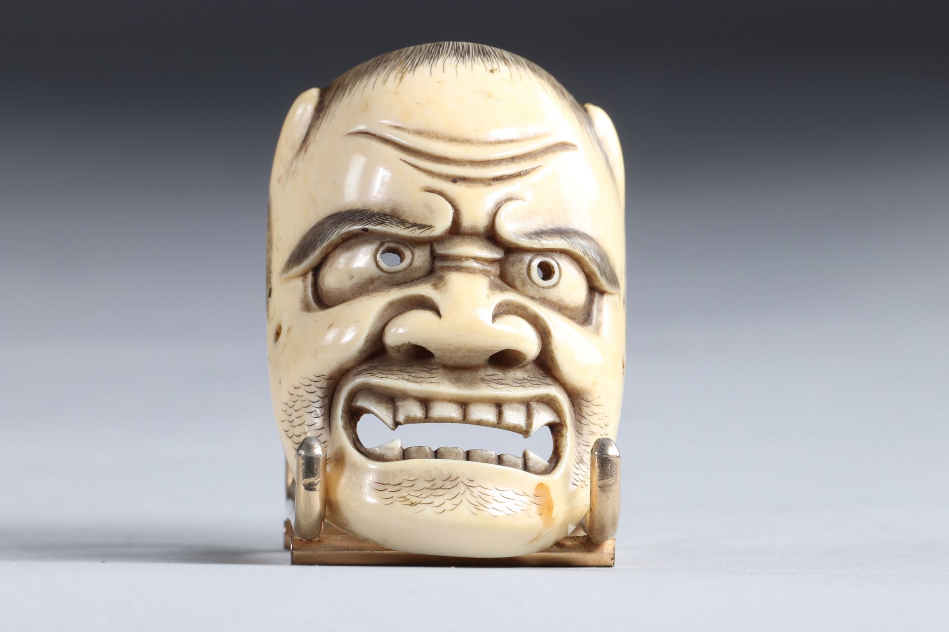 Netsuke / Okimono carved - a mask. Japan MEiji 19th period