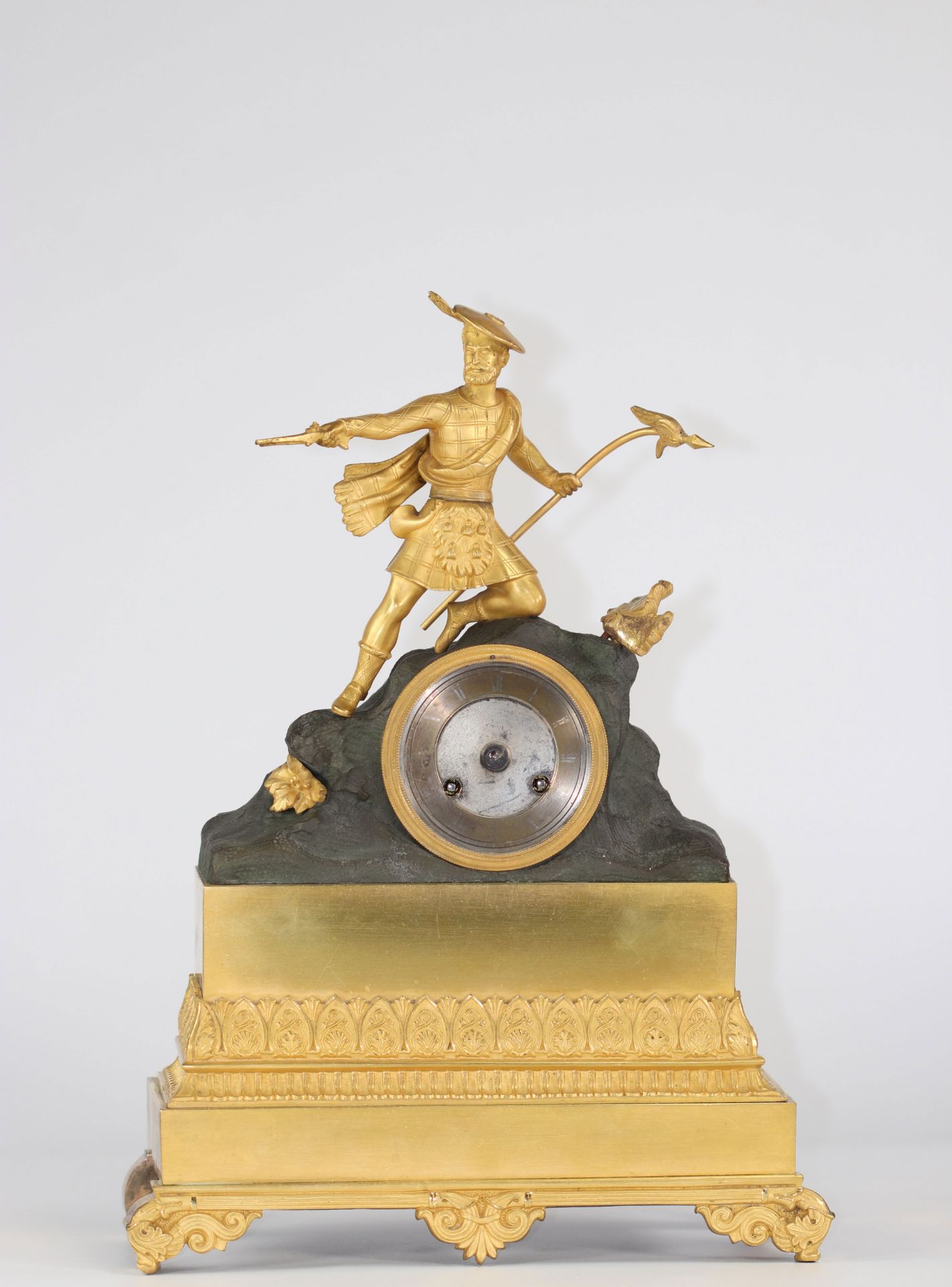 Empire period gilt bronze clock surmounted by a Scottish