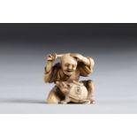 Netsuke carved - a character and an animal. Japan Meiji 19th century