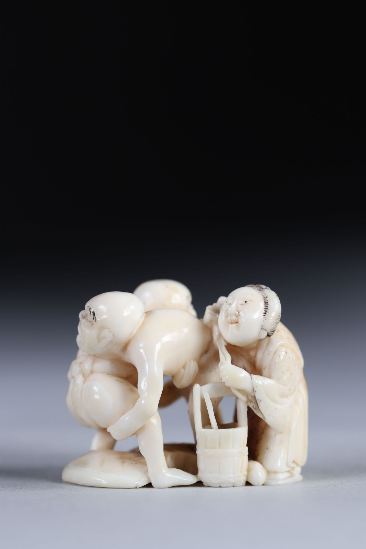 Netsuke carved - a wrestling scene. Japan Meiji period around 1900