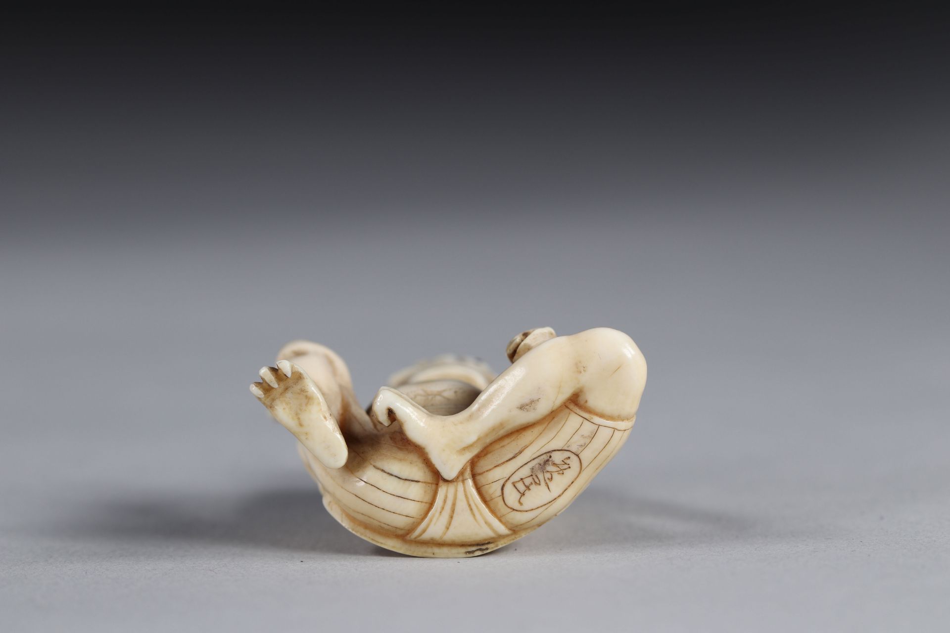 Netsuke carved - a seated Oni. Japan d"bu 20th - Image 4 of 4