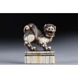 Netsuke / Okimono carved - a dog. Japan Meiji 19th century