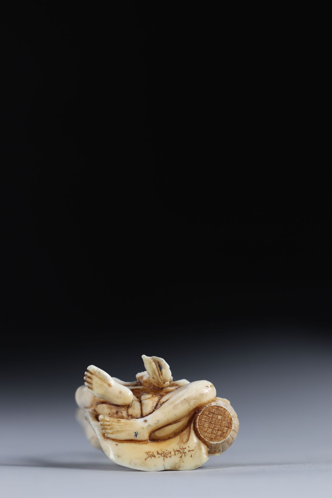 Netsuke carved - a cartoonish long-arm fisherman. Japan Meiji period late 19th - Image 3 of 3