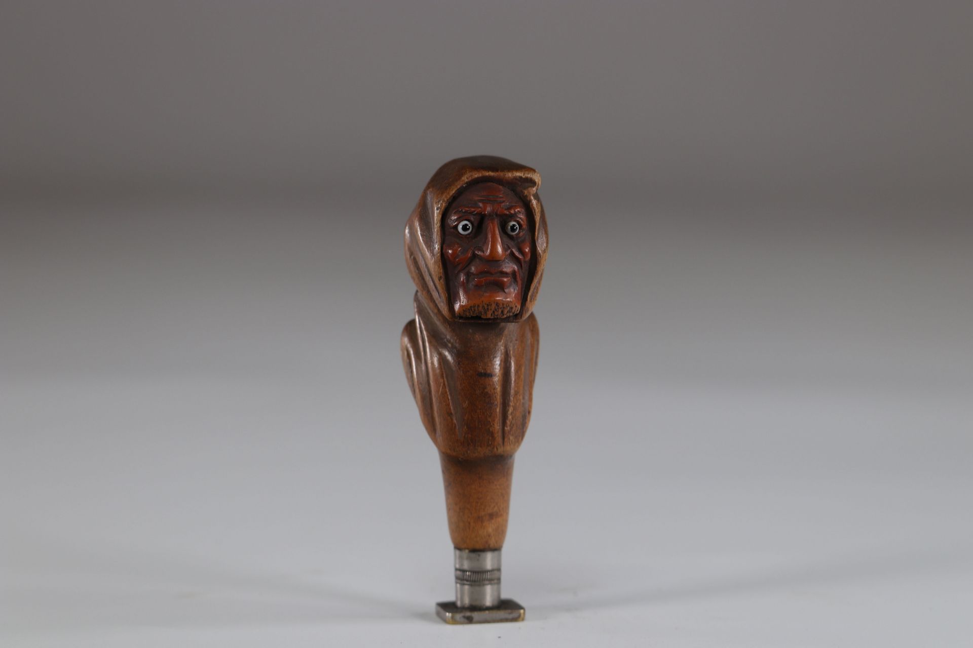 Grotesque head carved wooden seal