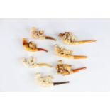 Lot of 7 pipes in foam and amber various animal subjects