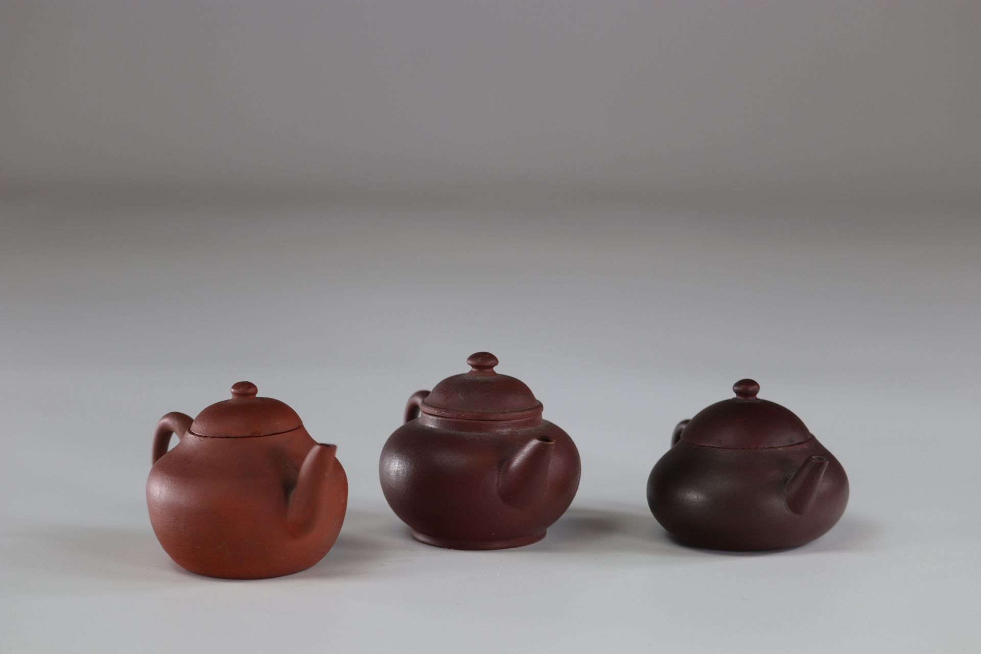 Chinese teapots (set of 3) In Terracotta Yixing marks under the pieces - Image 2 of 3