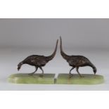 Pair of Vienna bronze bookends with pheasant decoration onyx base