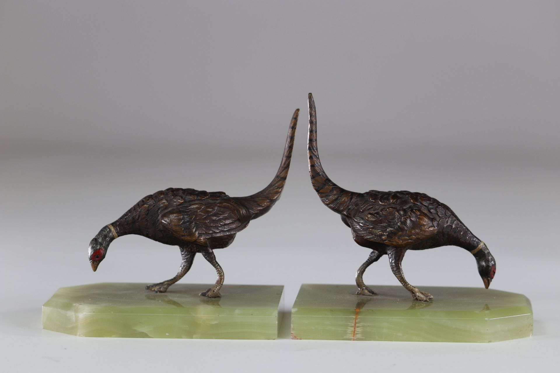 Pair of Vienna bronze bookends with pheasant decoration onyx base