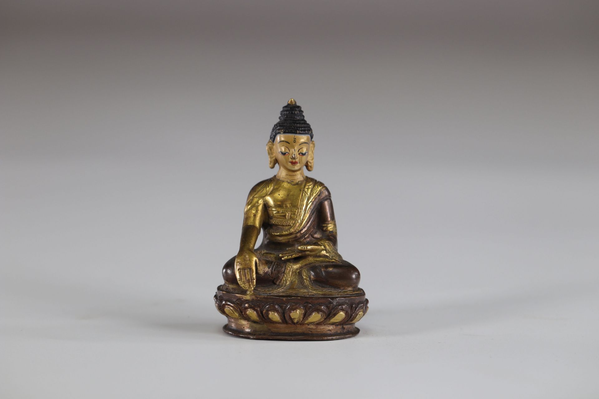 Asia buddha in gilded bronze