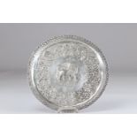 Silver dish in the center a lion probably India