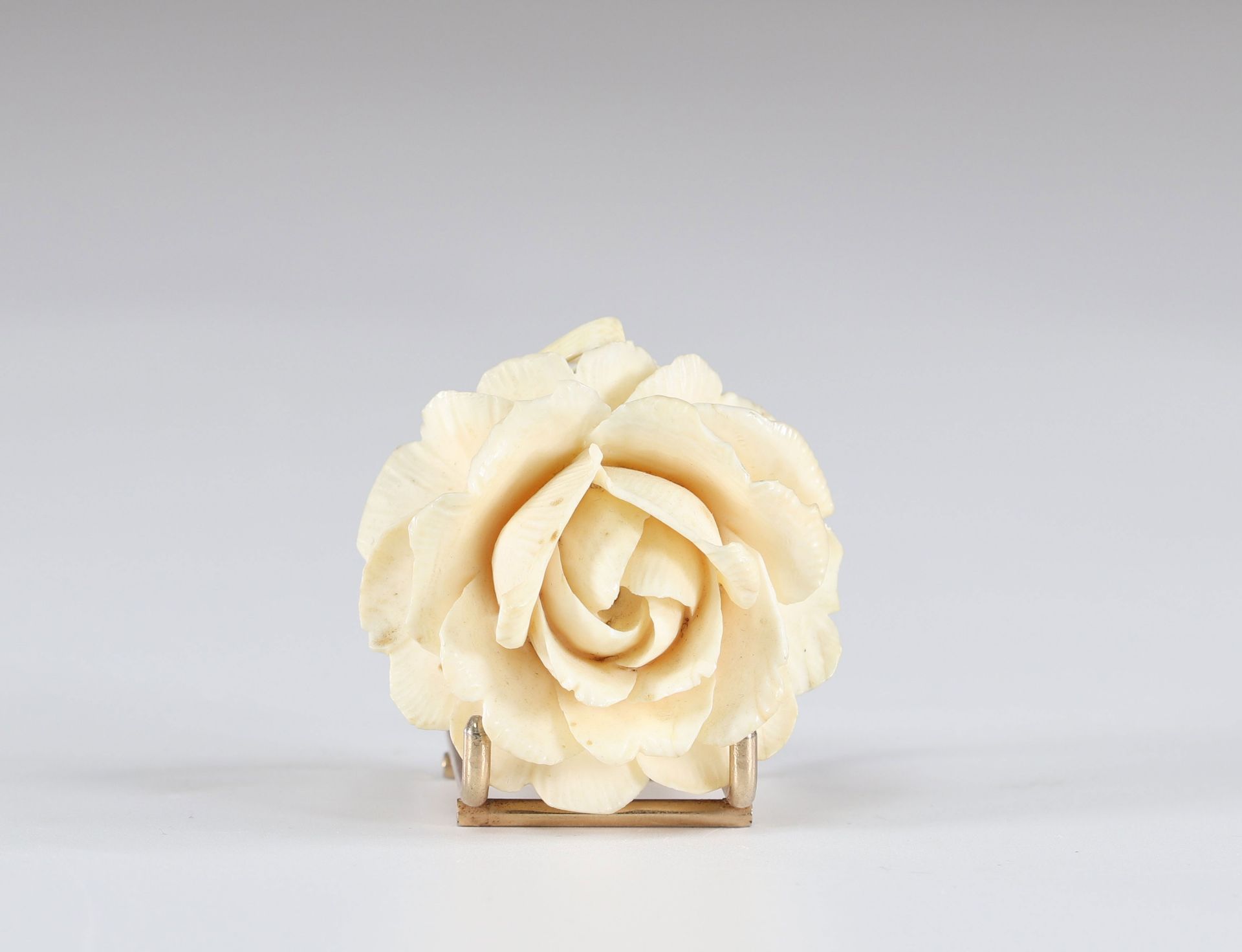 Ivory pendant carved with a rose circa 1900