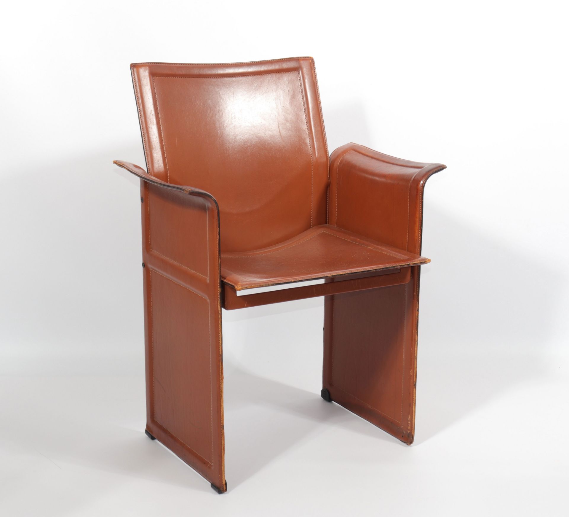 Suite of 12 Matteo Grassi chairs in brown patina leather