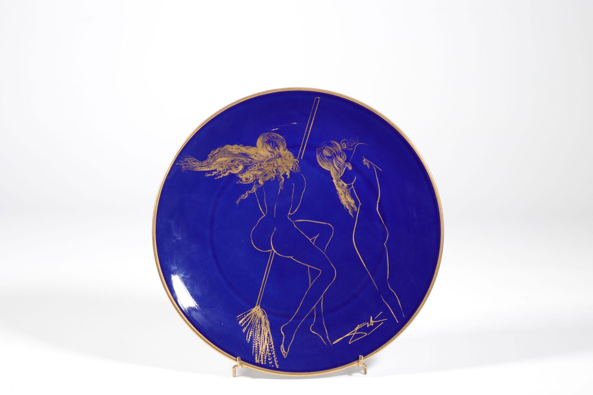 Salvador Dali. "Le Sabat". 1968. Limoges oven blue and gold plate. Signed "Dali" on the front in gil