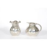 1 jug and 1 pewter vase signed J. Goardere