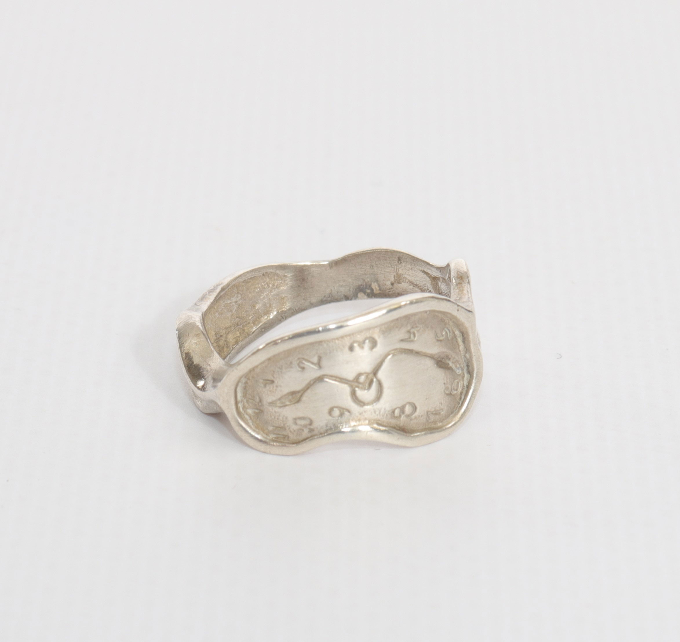 Salvador Dali. Circa 60. Soft watch. Sterling silver ring representing a soft watch.