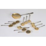 12 silver spoons and ice cream scoop, late 19th century, silver and vermeil Punch neck brace and pun