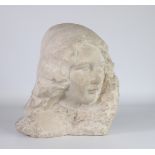 Head of a young woman 1900 in stone carved in French stone