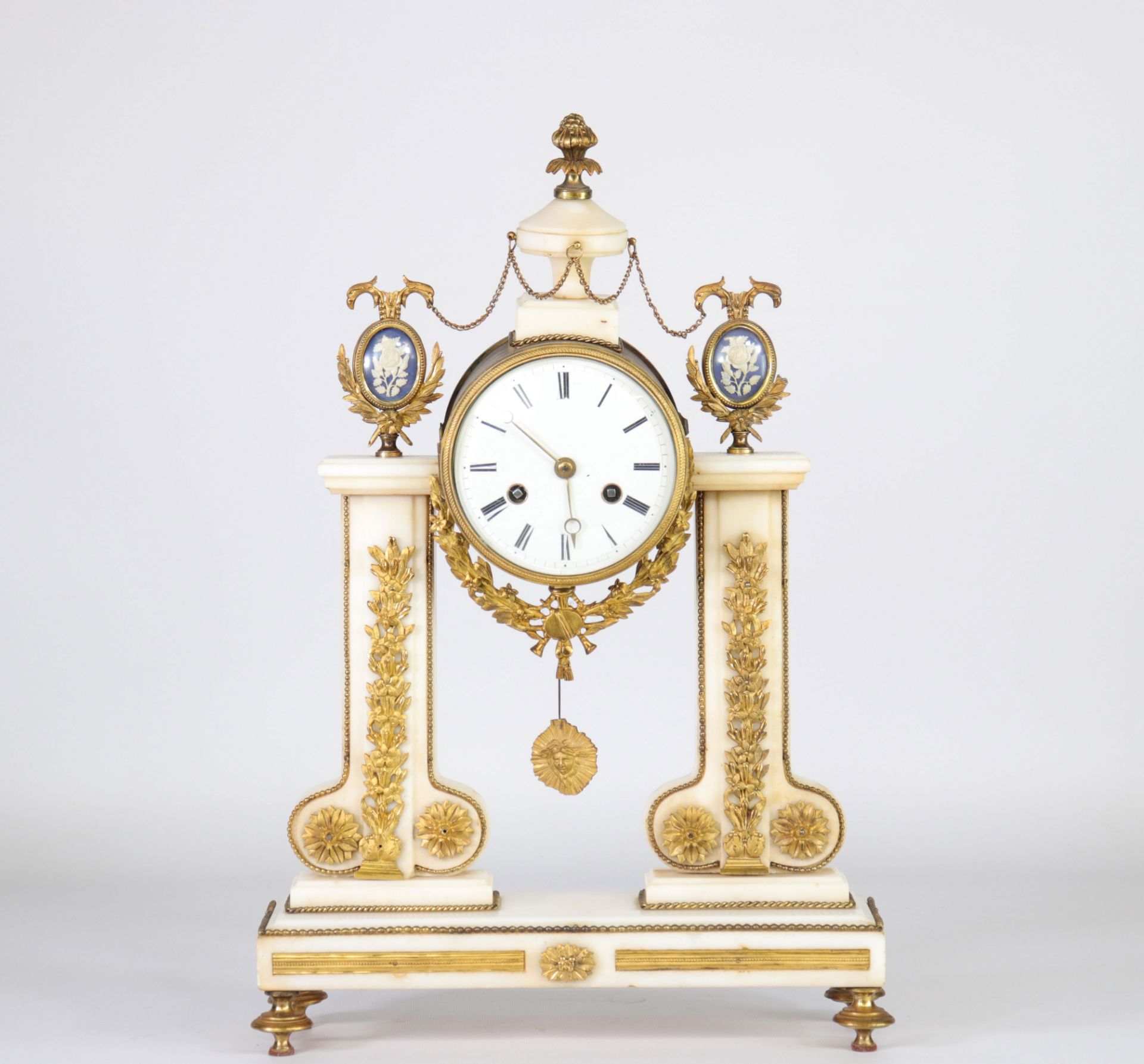 Louis XVI portico clock in white marble and bronze