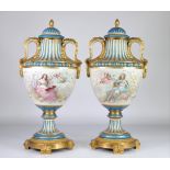 SÃ¨vres pair of monumental vases mounted on gilded bronze, painted with romantic scenes, the reverse