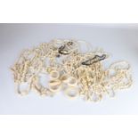 Lot of + - 40 Necklaces and 6 Bracelets in ivory