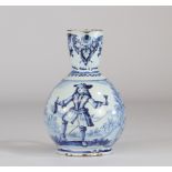 Rouen rare pitcher decorated with a character and dated 1728