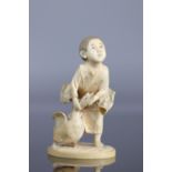 Japan Okimono carved of a young boy with a goose 19th