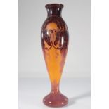 The imposing French glass vase with grape decoration