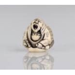 Japan netsuke carved with a Meiji period character