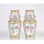 China pair of famille rose vases decorated with 19th century characters