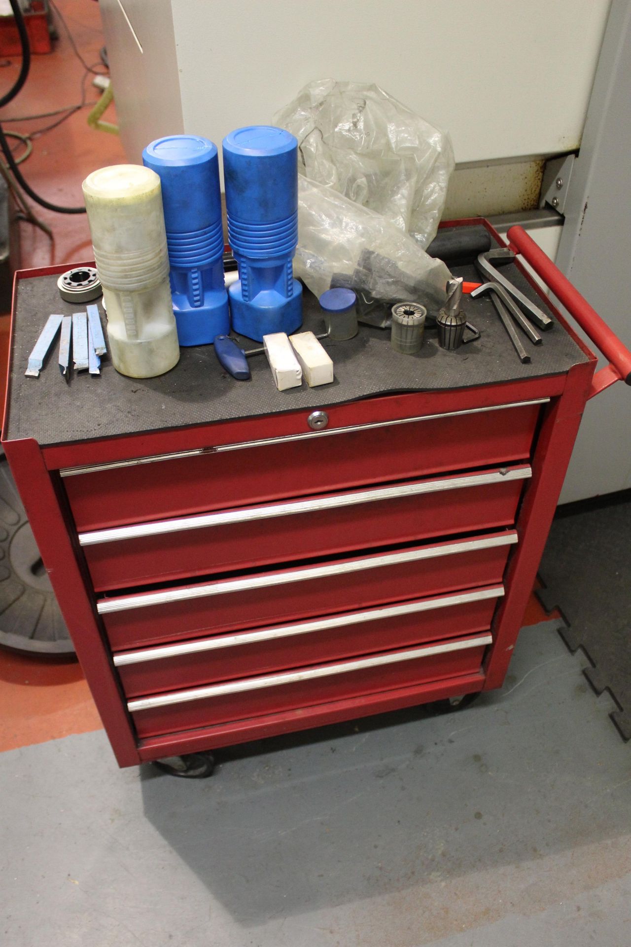 Mobile tool cabinet and contents comprising various milling bits, collets and general tooling