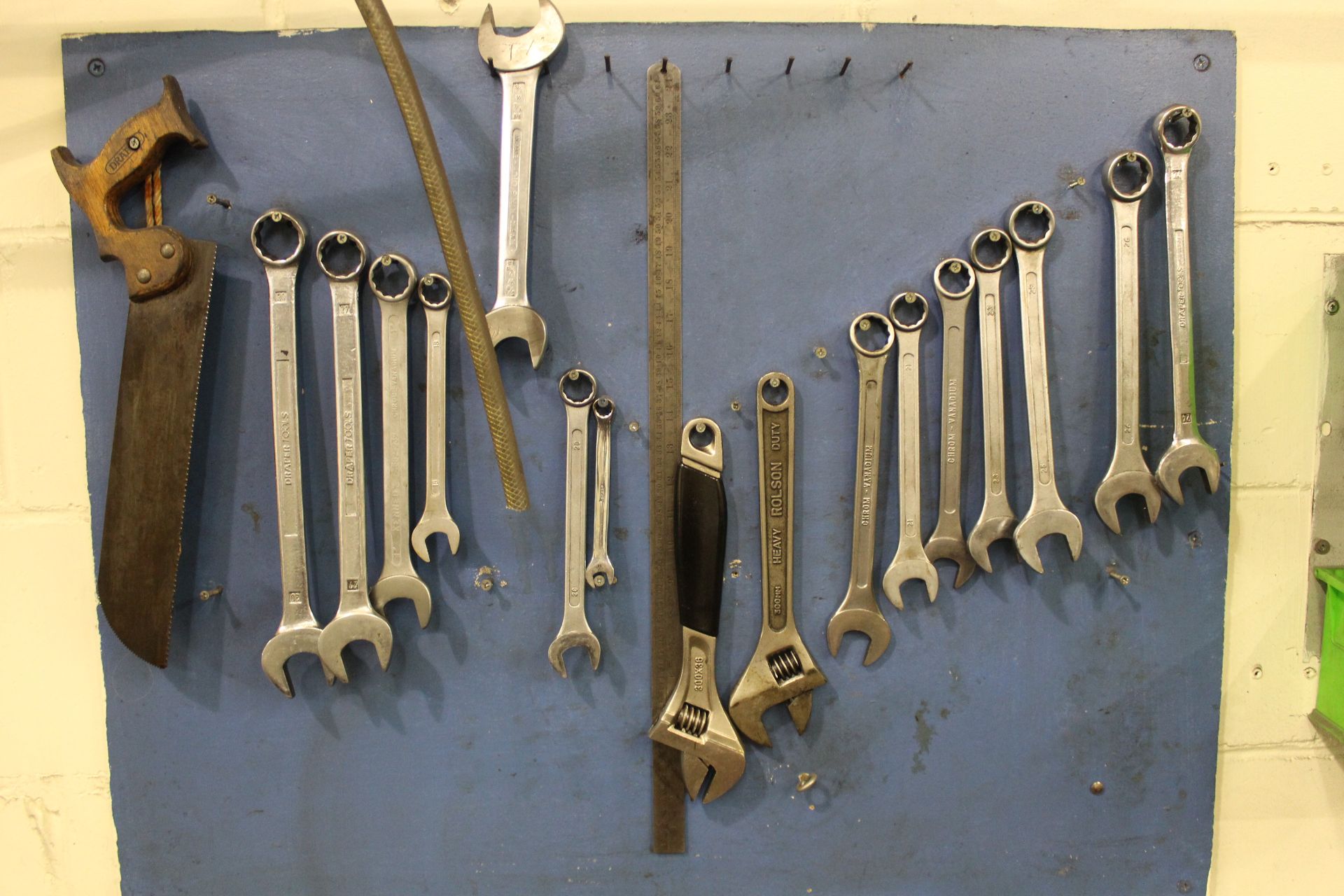 Tool board of various Draper and Chrome-Vandium Wrenches with lin bins of assorted drill bits,
