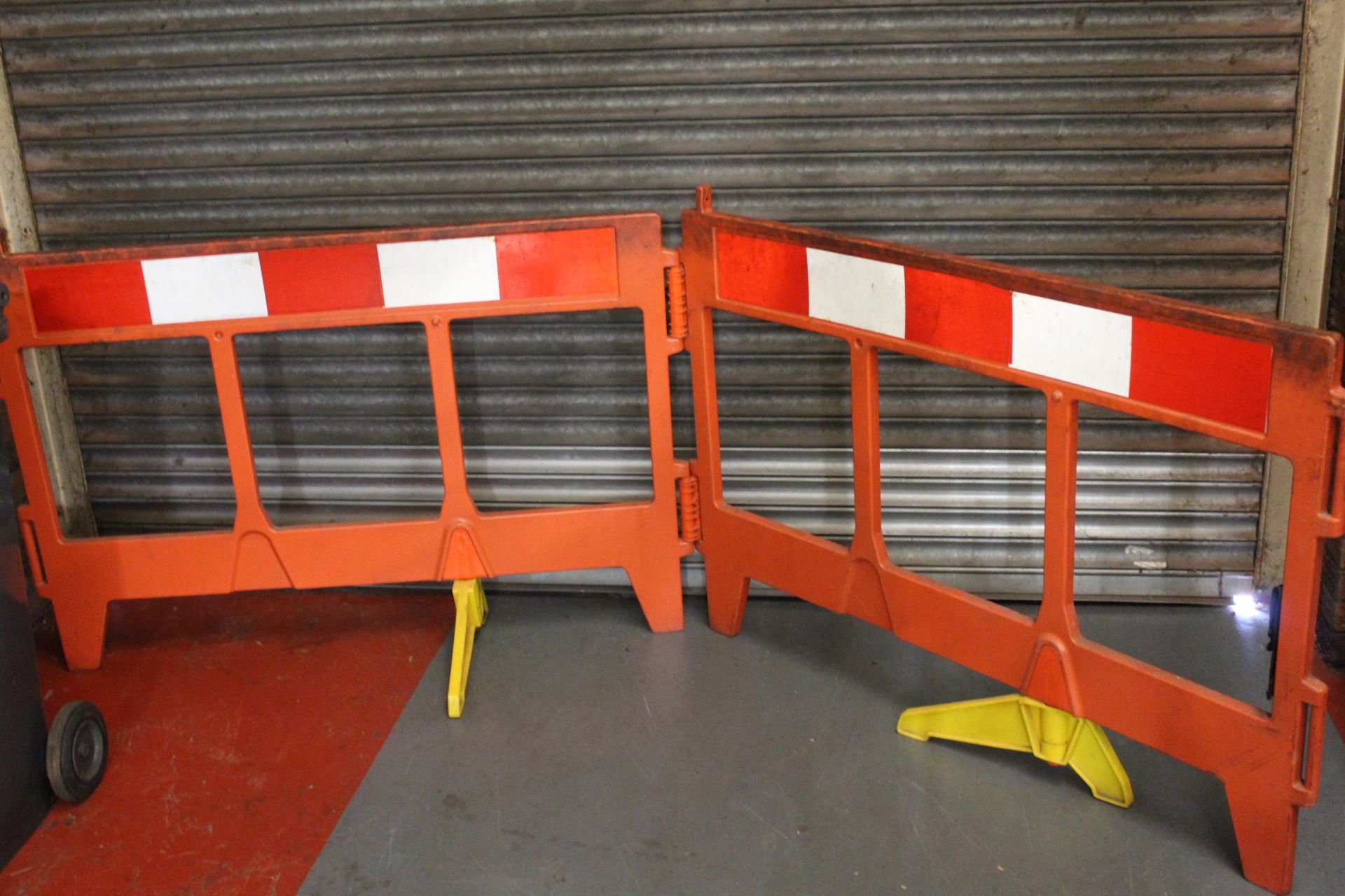 Folding site safety barrier