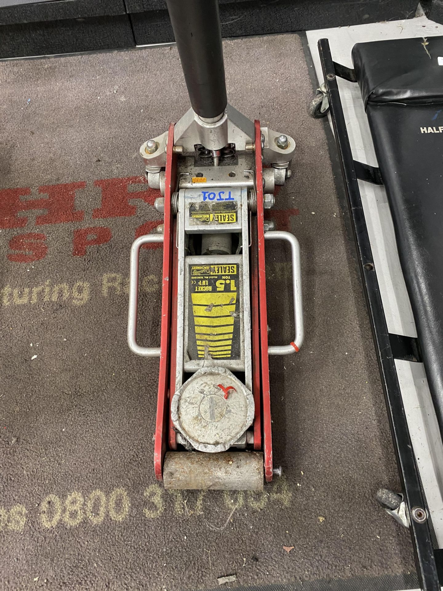 Sealey RJA1500 1.5 tonne hydraulic trolley jack and a Halfords mobile crawler board. - Image 2 of 4