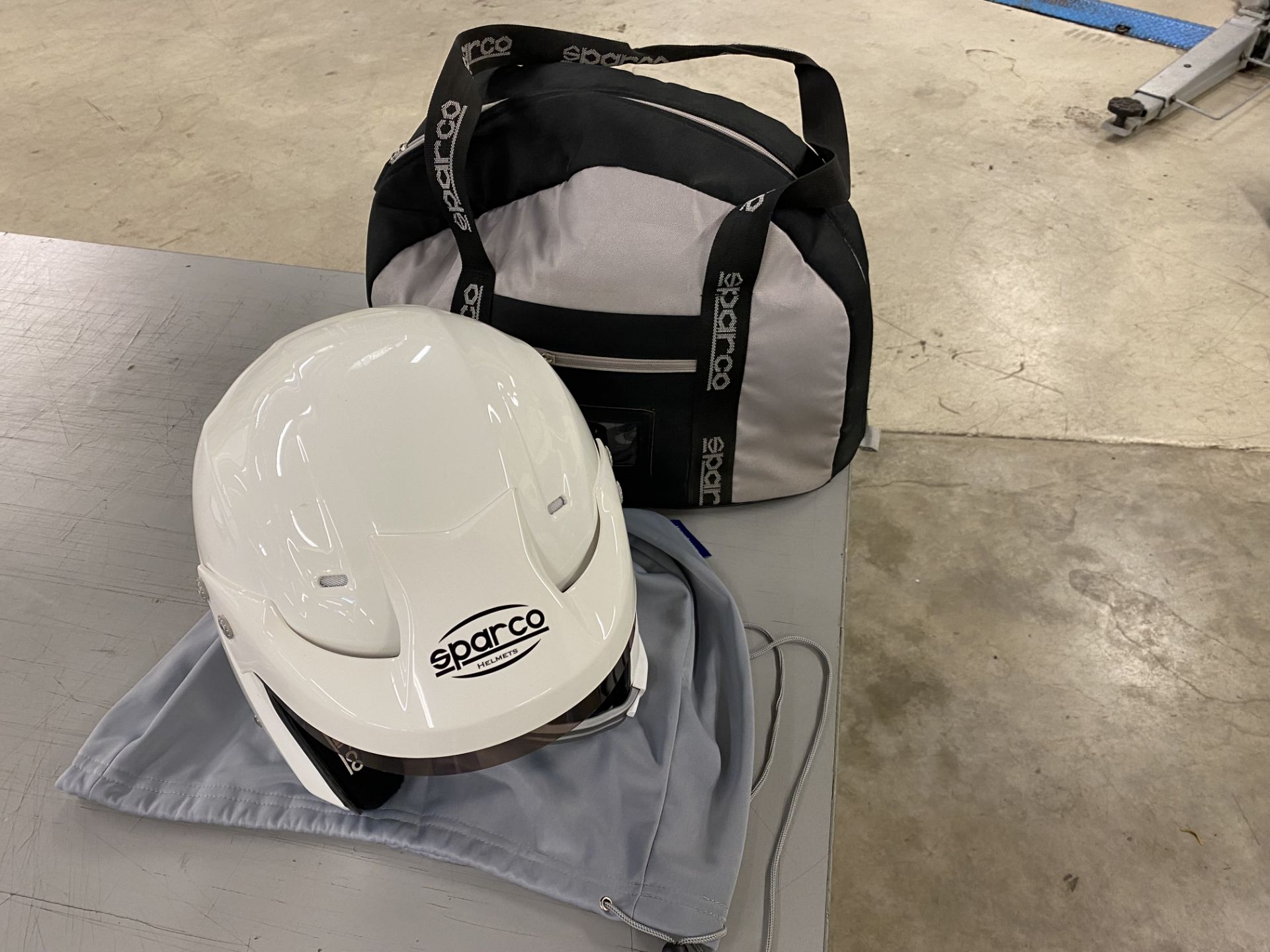 Sparco WTXJ-5i open face racing helmet with microphone and connector with cover and storage bag size