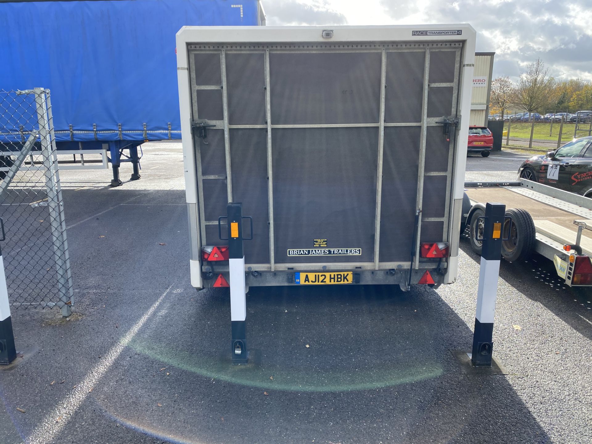 Brian James Trailers covered race car transporter 4 trailer with drive up ramp with side door, 5. - Image 3 of 8