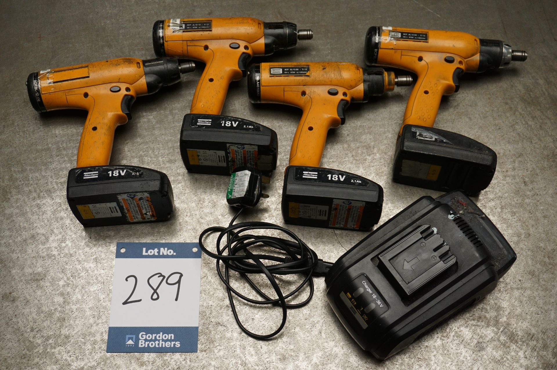 4 x Atlas Copco BCP BL-12-I06 -5/12, 18 volt cordless screwdrivers with charging unit