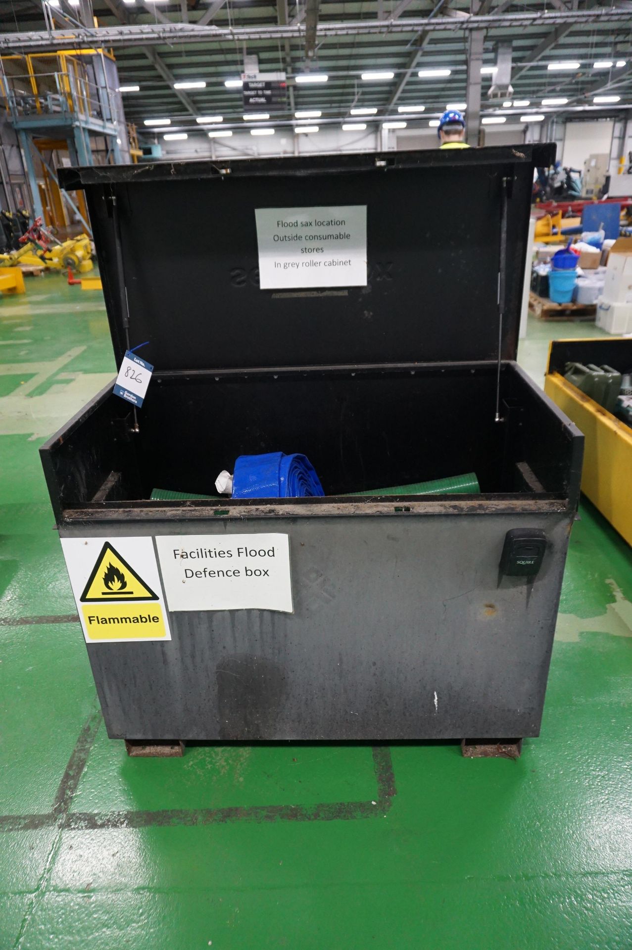 Steel hazardous chemical storage chest with portable water pump and ancillary equipment